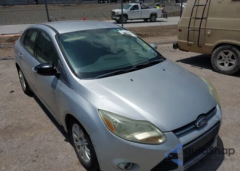 2012 Ford Focus Se z USA, uszkodzony, nr VIN 1FAHP3F20CL186205